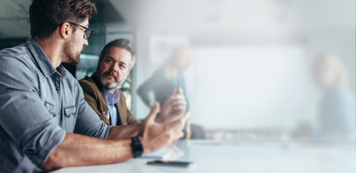 Some employees talking during a meeting.
