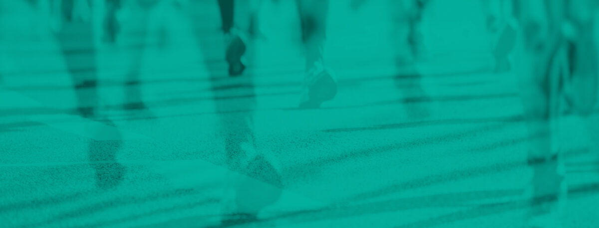 Feet running on pavement.